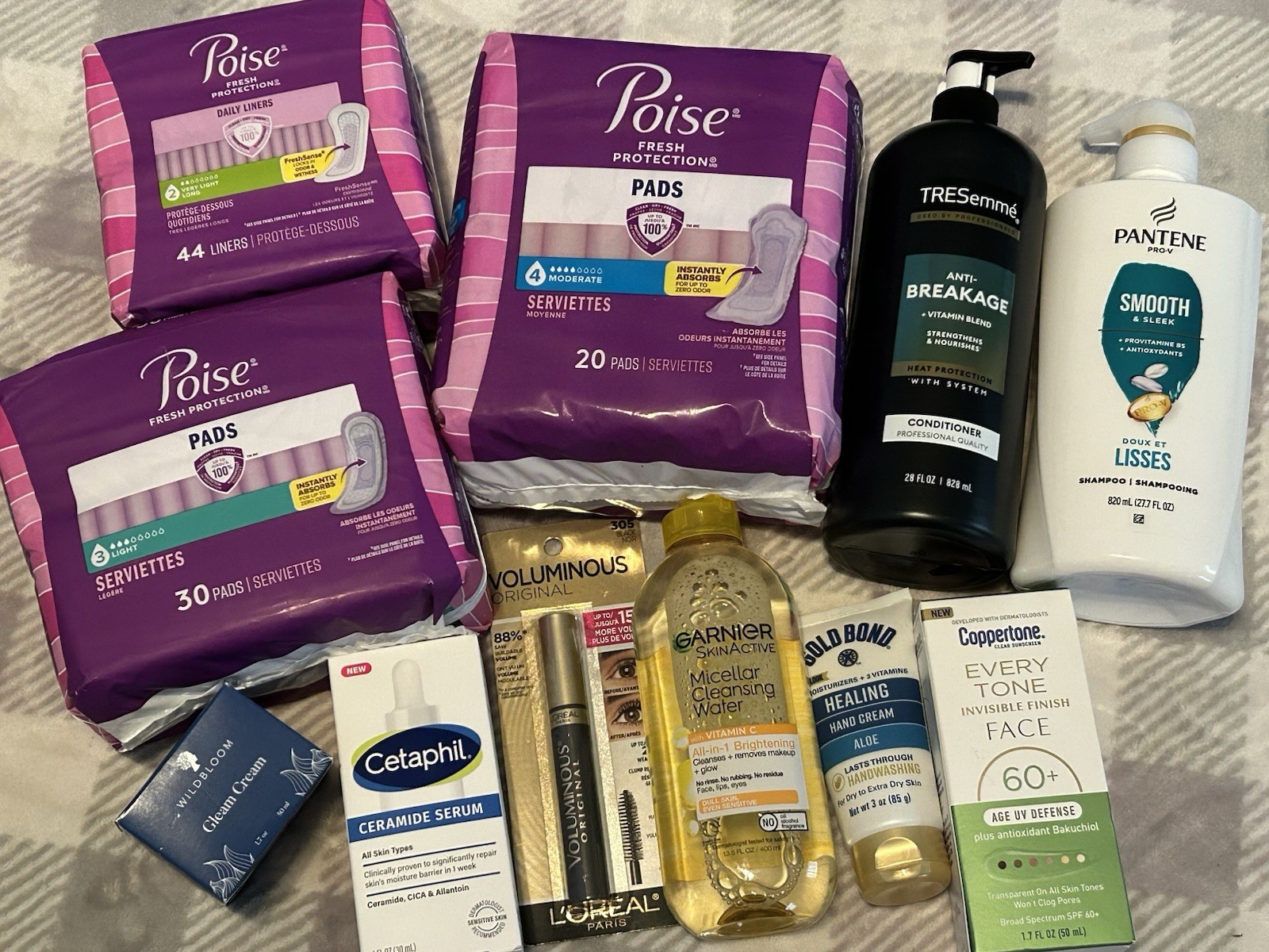 Poise pads Wild Bloom Cetaphil serum ultimate personal care antiaging bundle 11