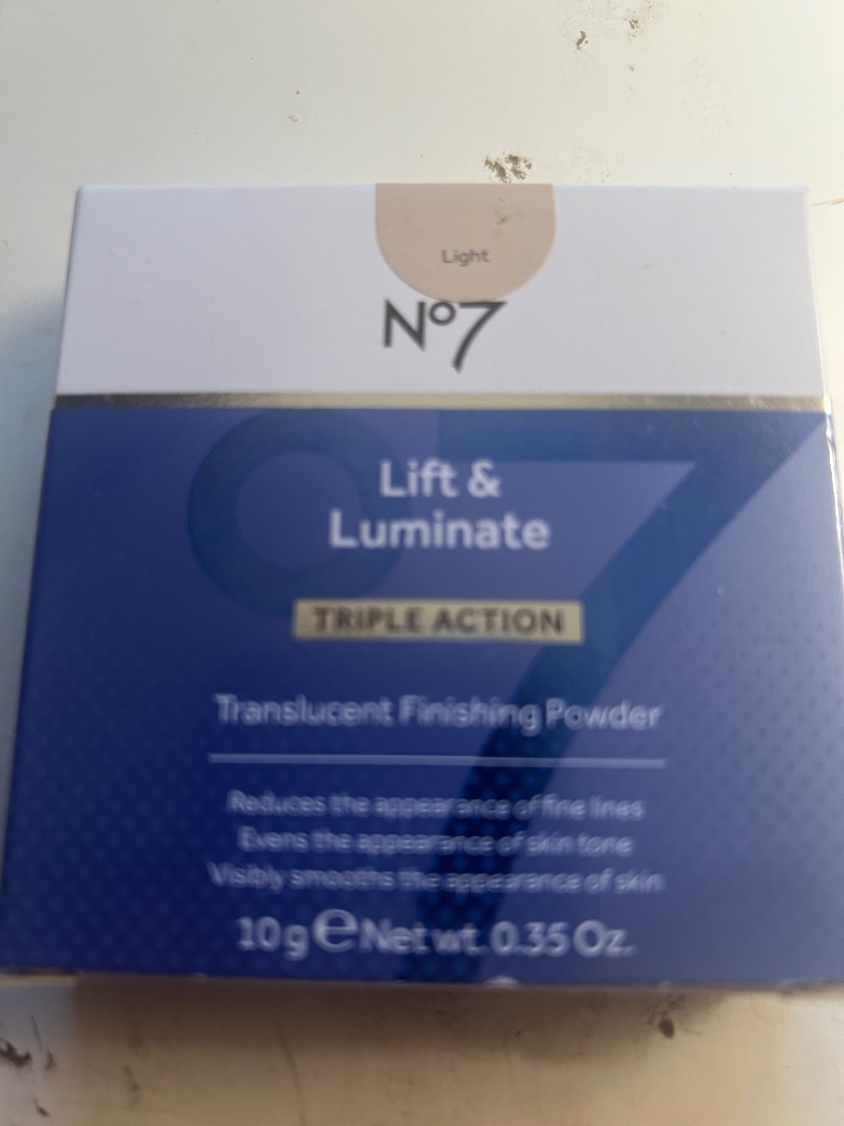 No7 Lift & Luminate Triple Action Translucent Finishing Powder in Medium .35 oz